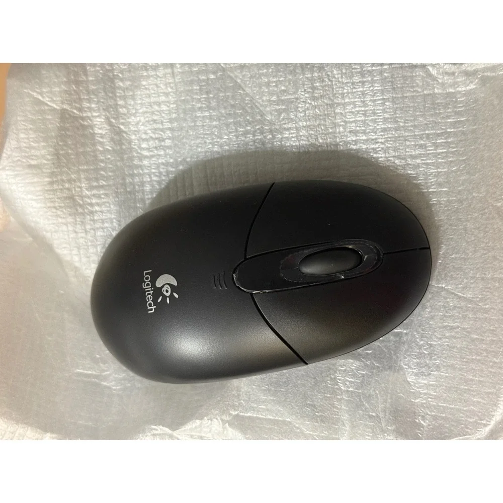 Logitech Cordless Desktop‎ EX 100 Wireless Keyboard & Optical Mouse Bundle Black